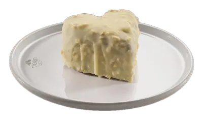 DORO CAKE Beyaz Çikolatalı Kare Pasta — Rendelenmiş beyaz çikolatayla kaplanmış kare dilim pasta